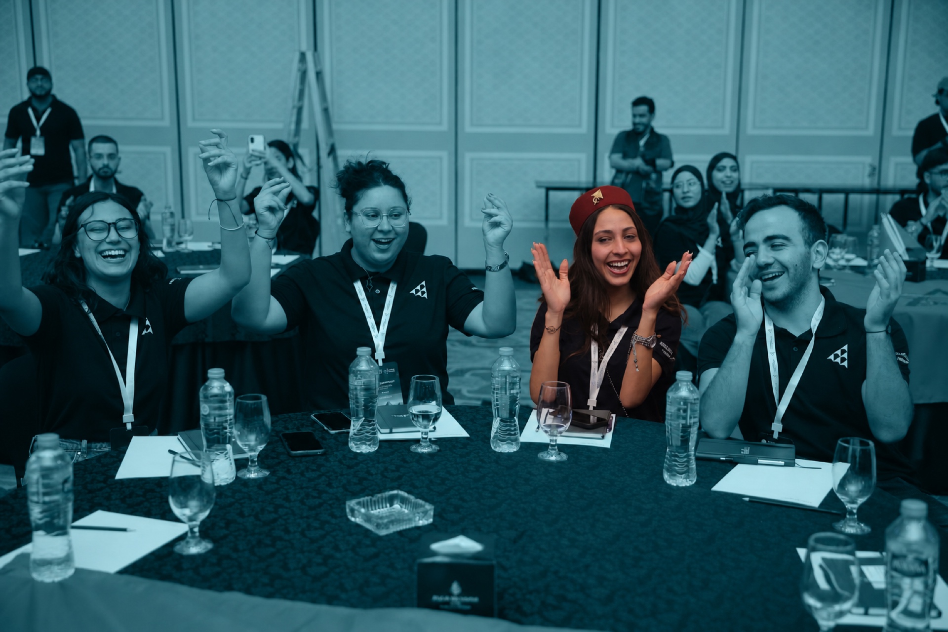 Students laughing together at a table
