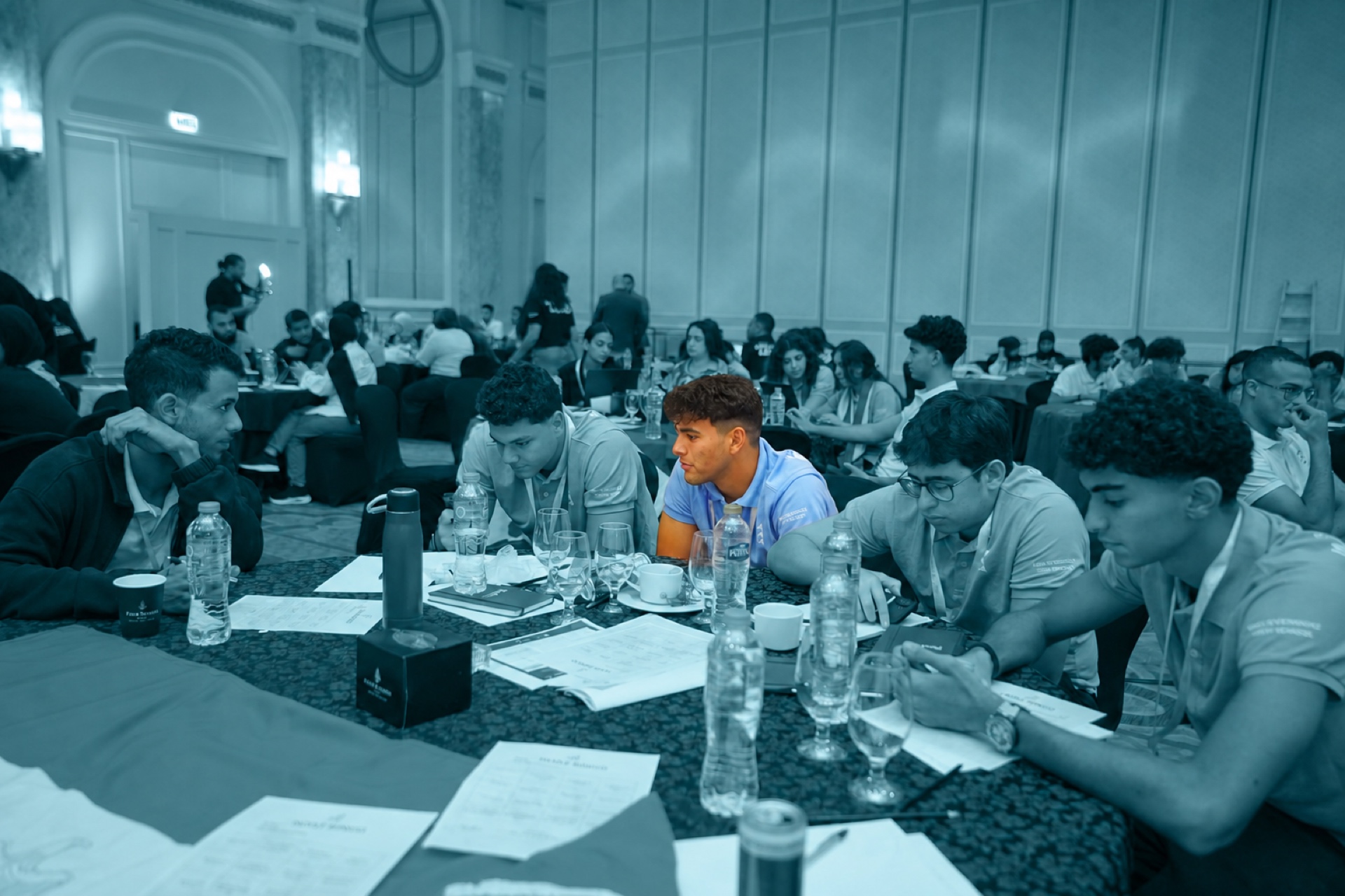 A student team working together at a table